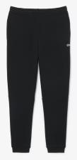 LACOSTE Pantaloni della tuta tapered fit in tessuto felpato uomo nero